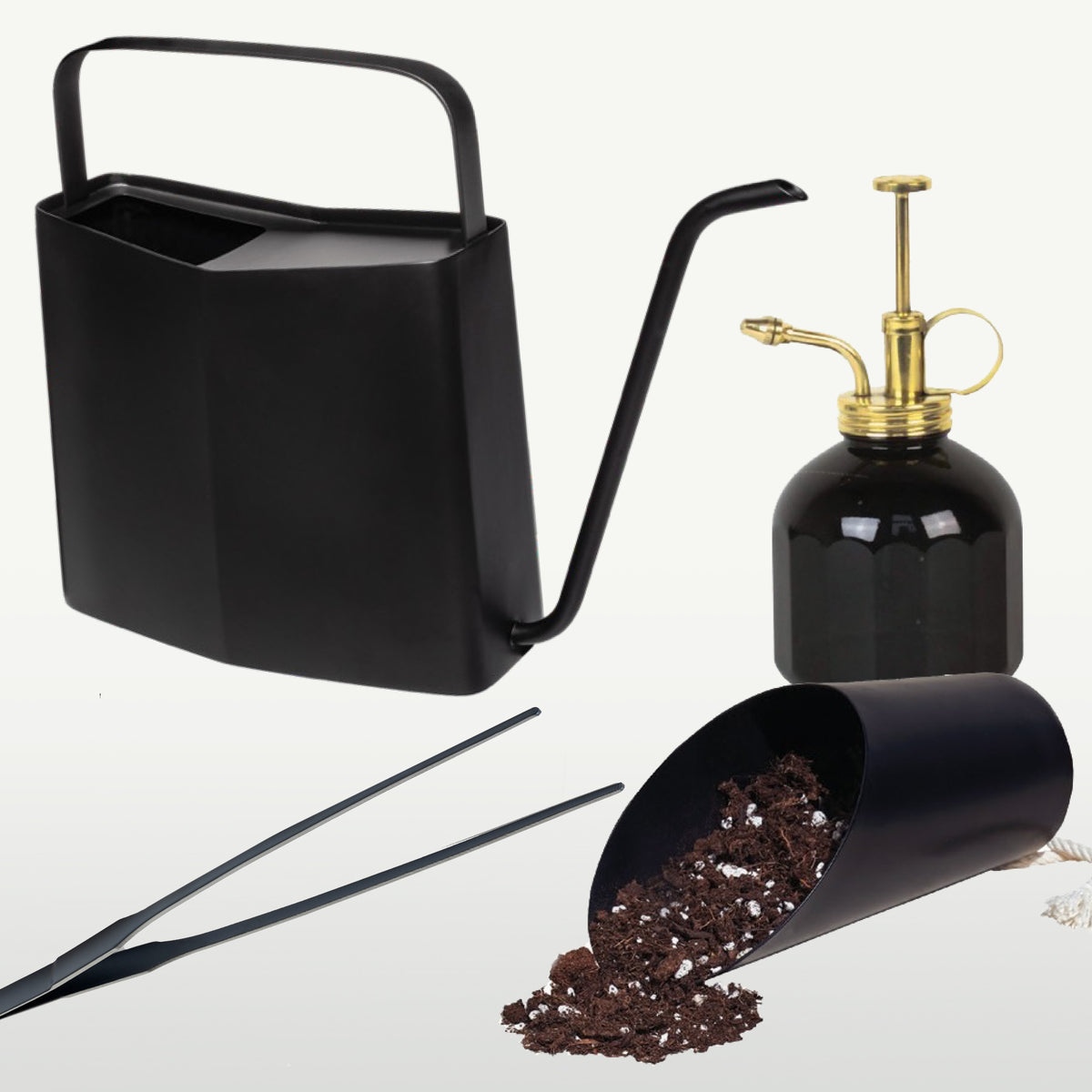 A sleek black watering can, a brass spray bottle, and a soil scoop, all designed for efficient plant care.