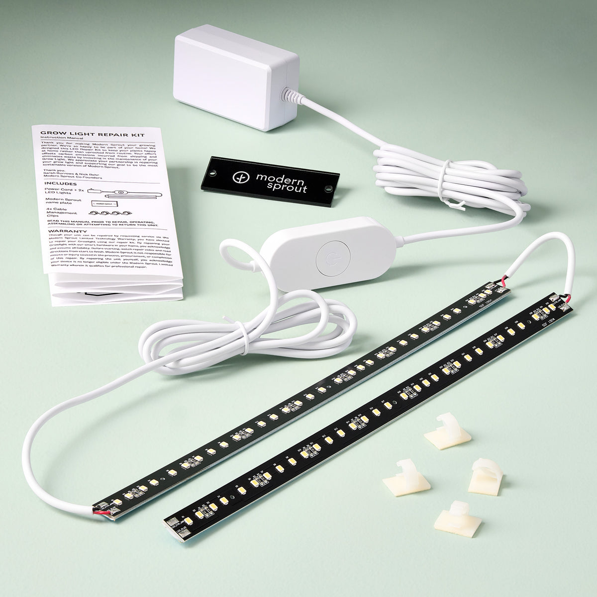 Grow light repair kit featuring LED strips, power adapter, switch, and installation instructions on a light green background.