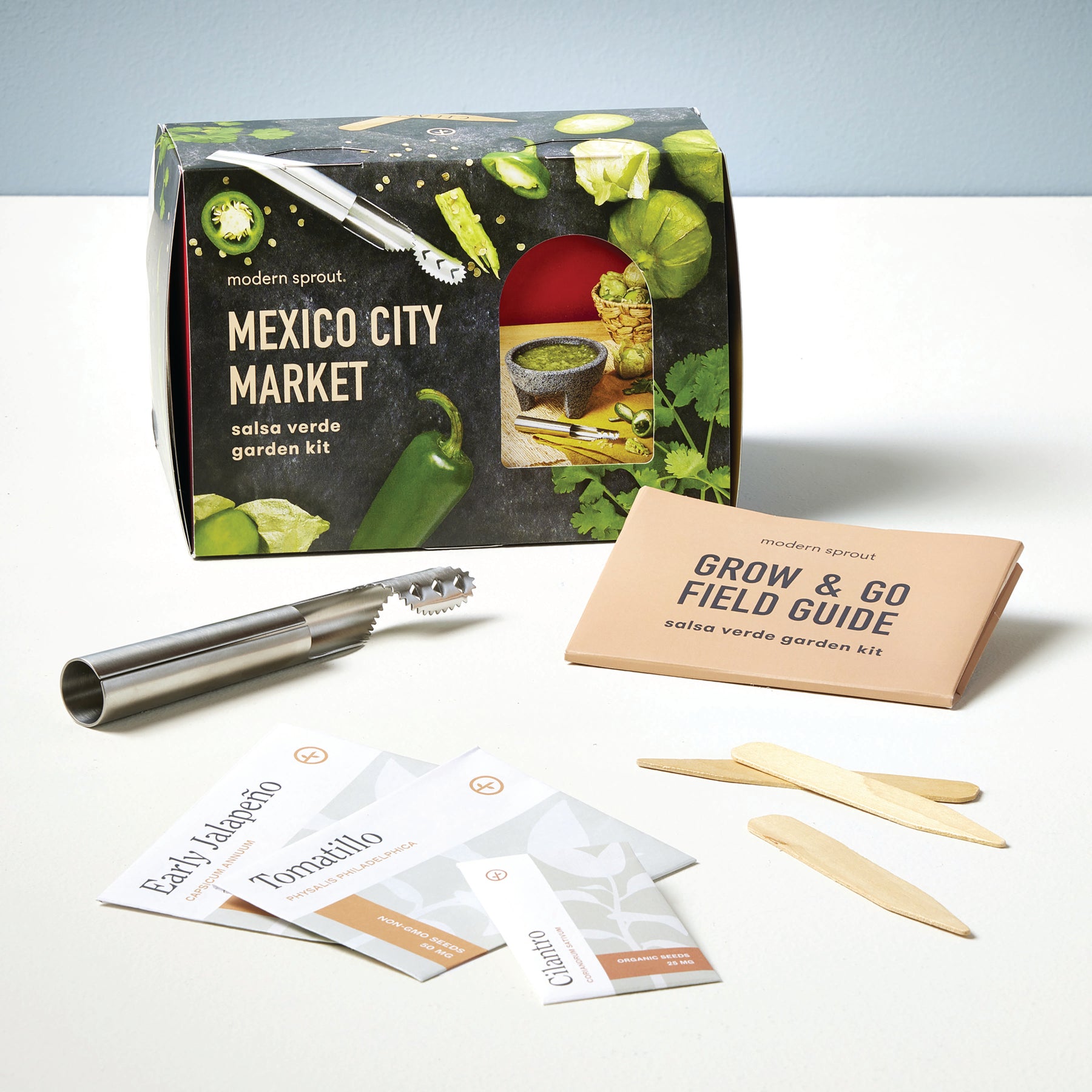 Seed collection and accessories for a salsa verde garden kit, including planting instructions and labels.
