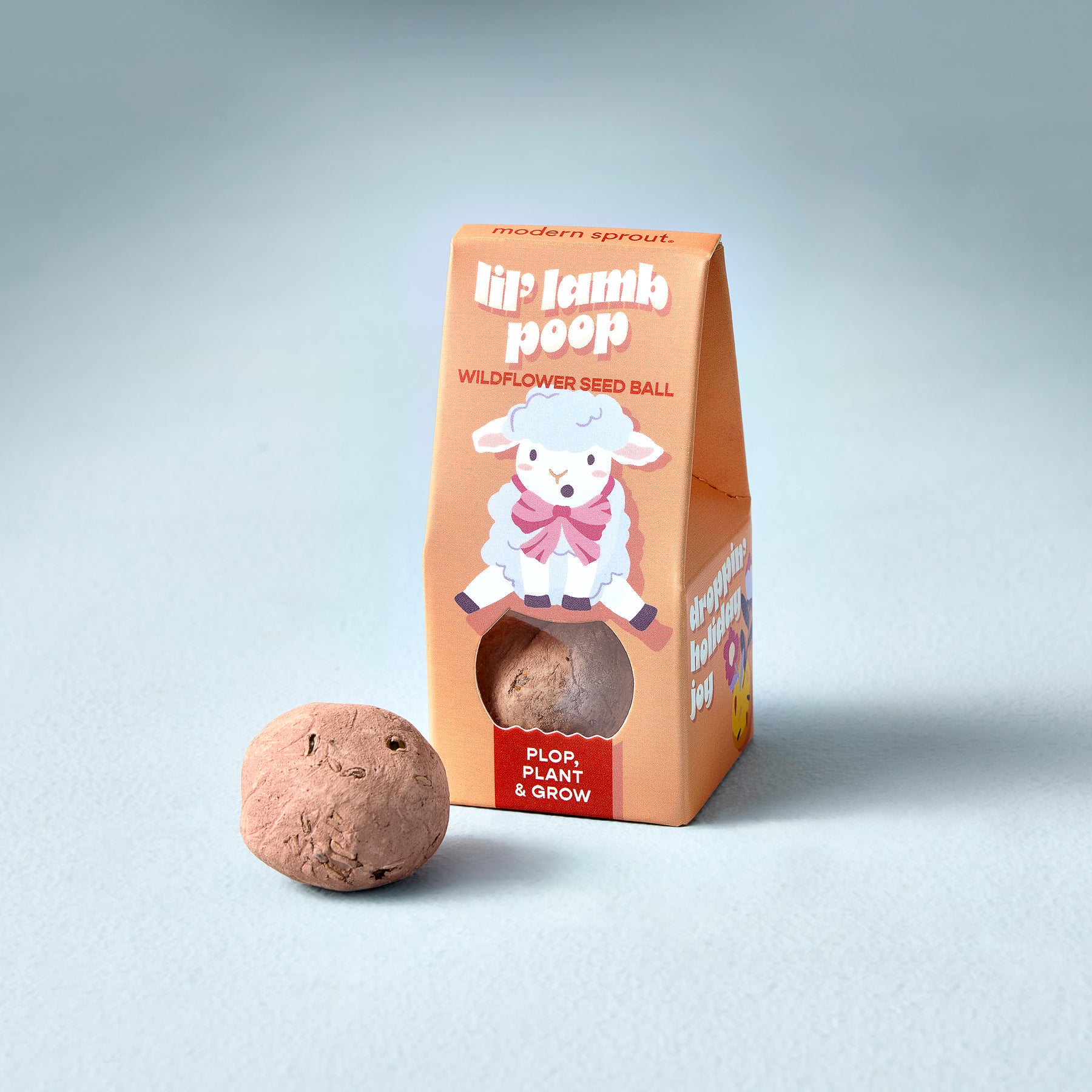 Wildflower seed ball in a playful lamb-themed package, designed for easy planting and growing.