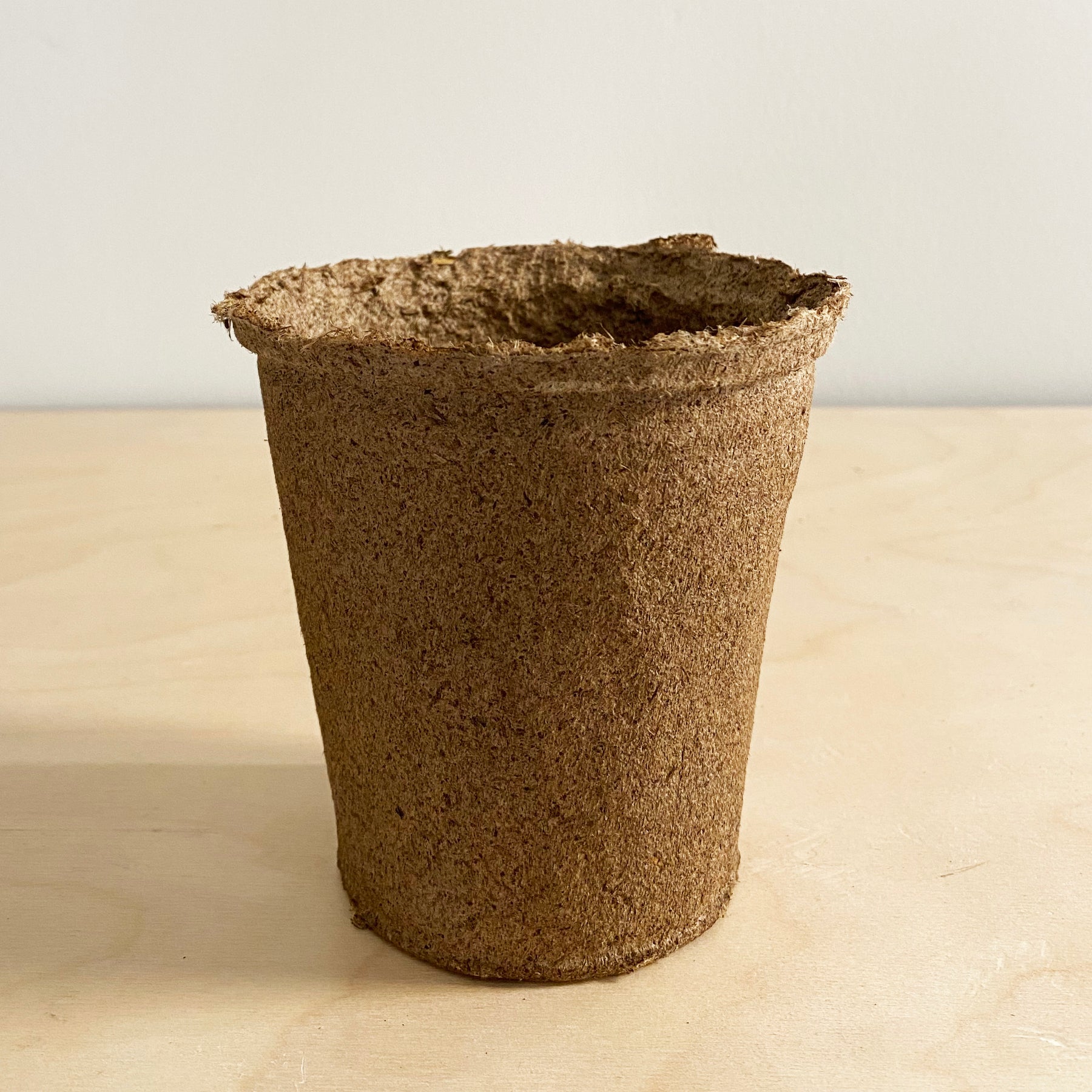 Four-inch biodegradable CowPots made from composted cow manure, ideal for starting seedlings. Pack of 15.