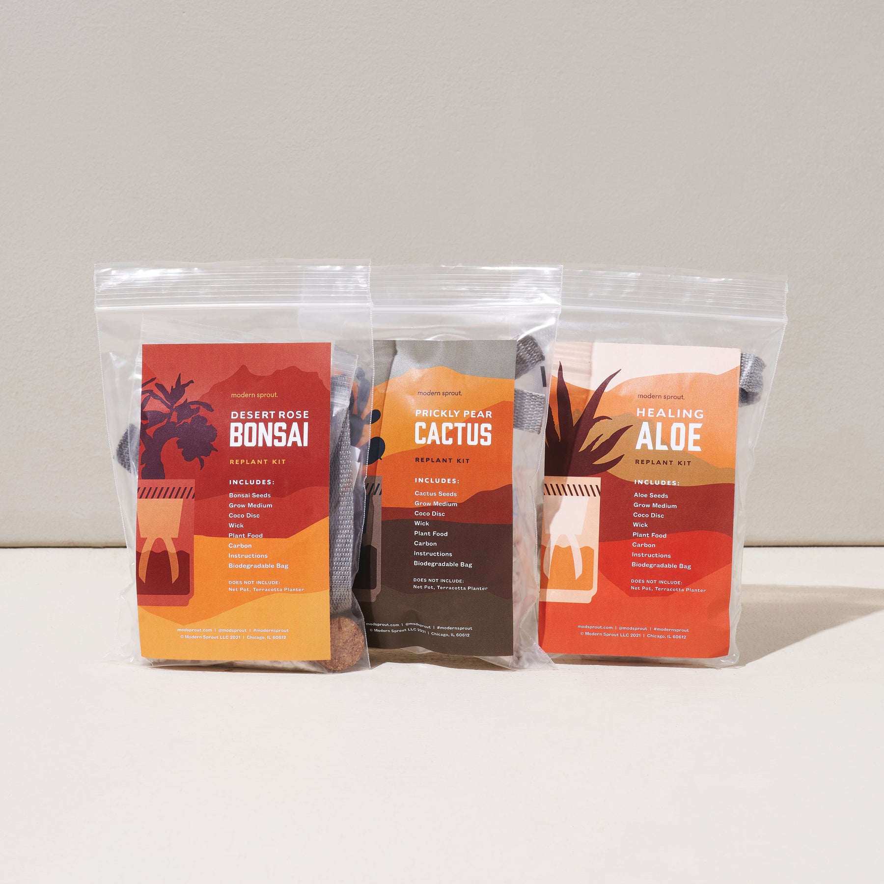 Passive Hydroponic Replant Kit featuring three packages: Desert Rose Bonsai, Prickly Pear Cactus, and Healing Aloe.