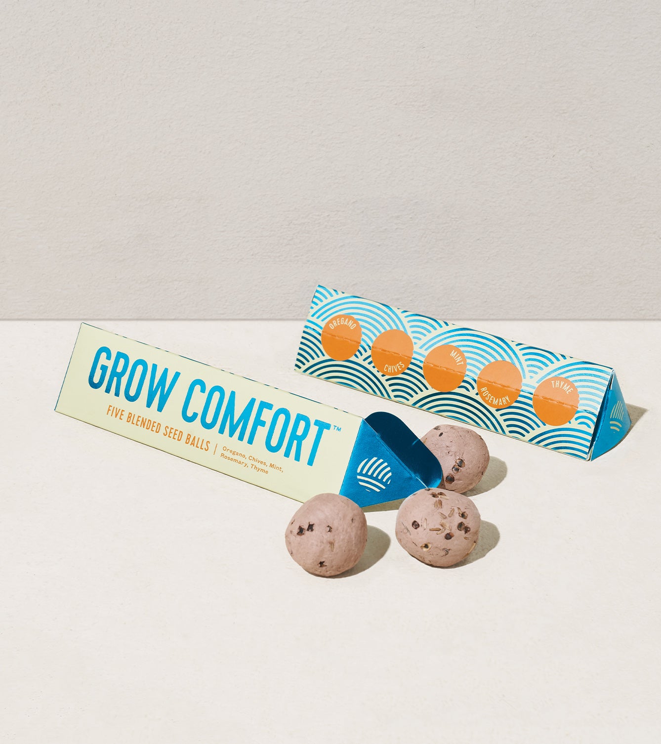 Bright Side Seed Balls packaging with three seed balls displayed, promoting easy planting for vibrant gardens.