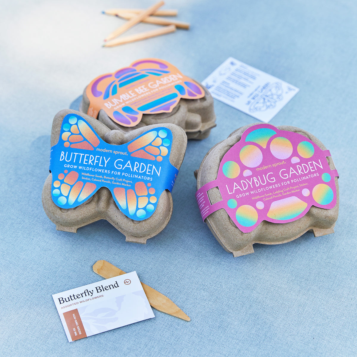 Curious Critters Garden Kits featuring Butterfly, Bumblebee, and Ladybug designs for growing wildflowers for pollinators.