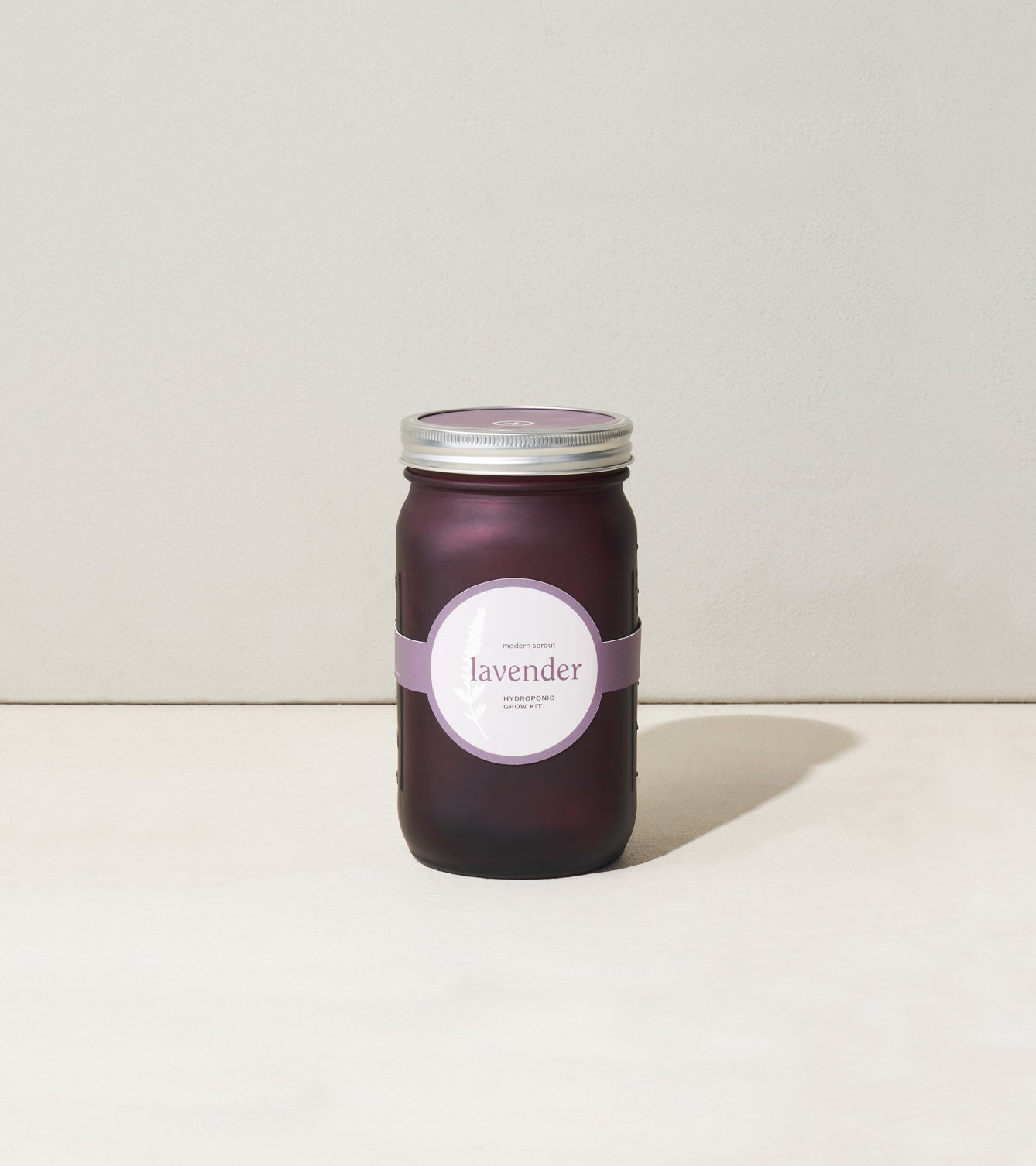 Lavender garden jar featuring a sleek design with a purple label, perfect for home decor or gifting.