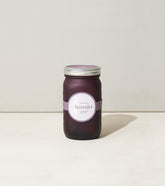 Lavender garden jar featuring a sleek design with a purple label, perfect for home decor or gifting.