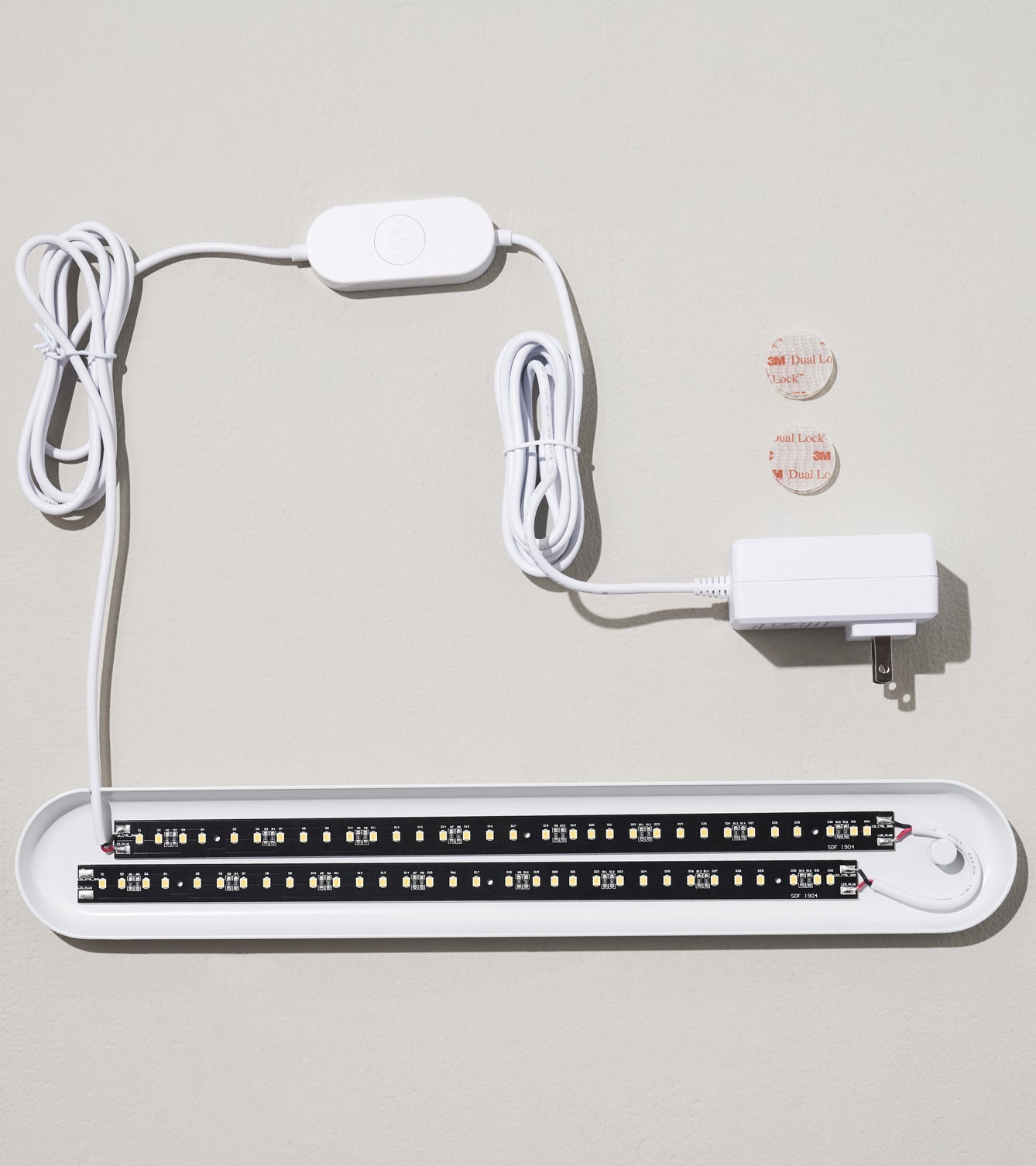 Smart Growbar with LED lights, power adapter, and control switch, designed for indoor plant growth.