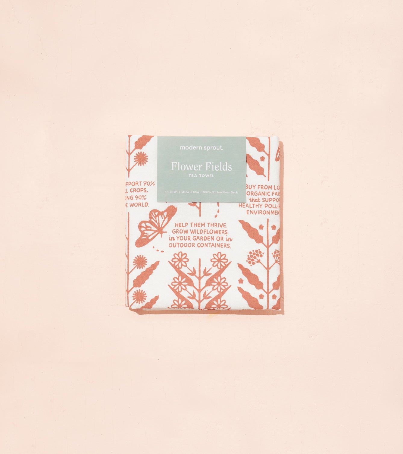 Modern Sprout Flower Fields tea towels featuring floral designs and eco-friendly messaging, neatly packaged.