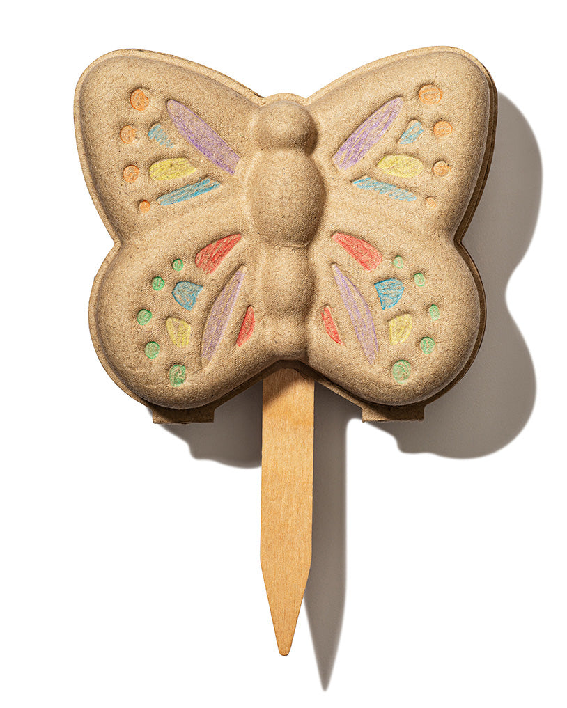 Butterfly-shaped garden marker made from biodegradable material, featuring colorful details and a wooden stake.