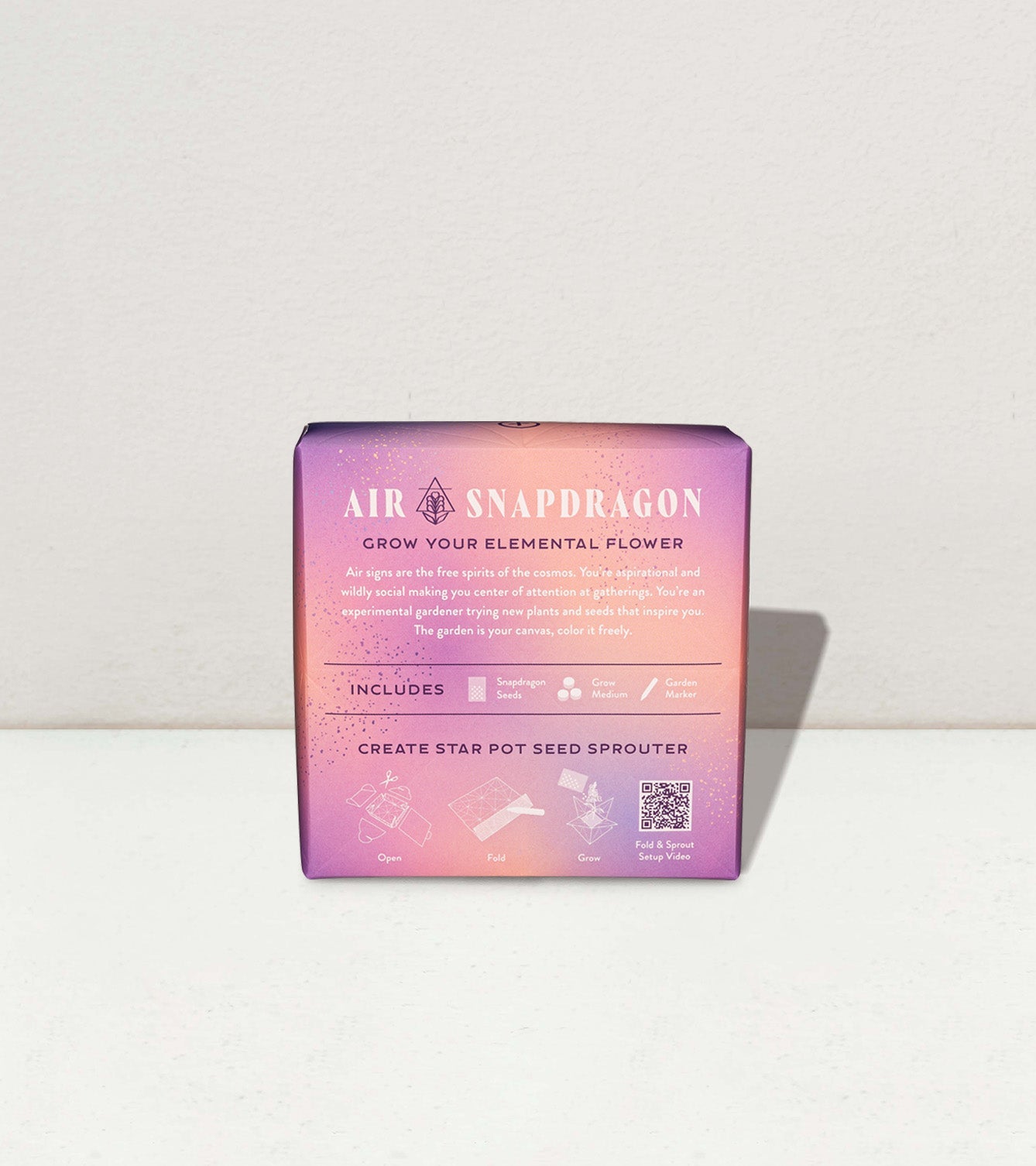 Cosmic Seed Kit packaging featuring Snapdragon seeds with instructions for growing and a star pot seed sprouter.