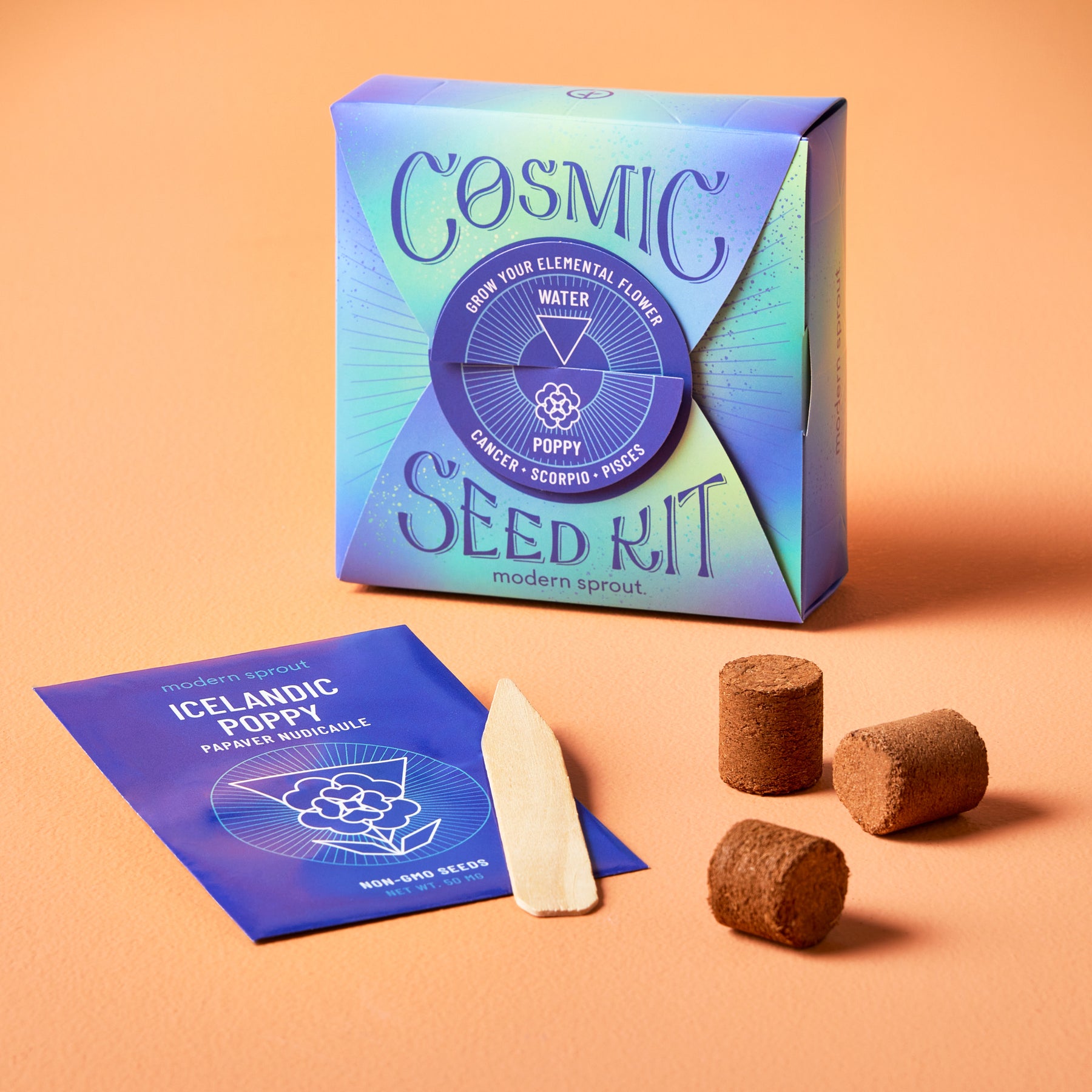 Cosmic Seed Kit featuring Icelandic poppy seeds, planting discs, and a wooden stick on a peach background.
