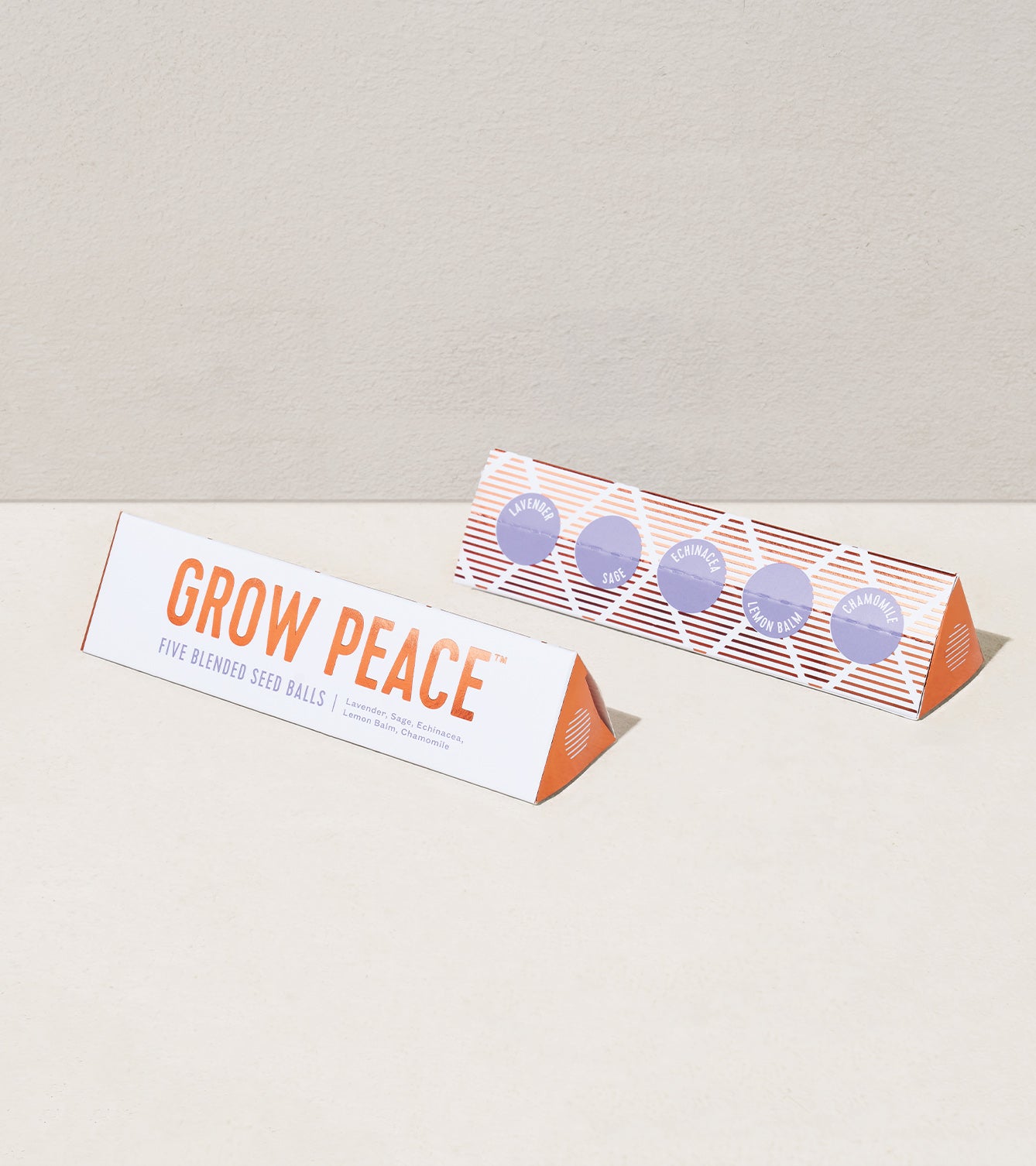 Bright Side Seed Balls packaging featuring "Grow Peace" and five blended seed balls for planting.