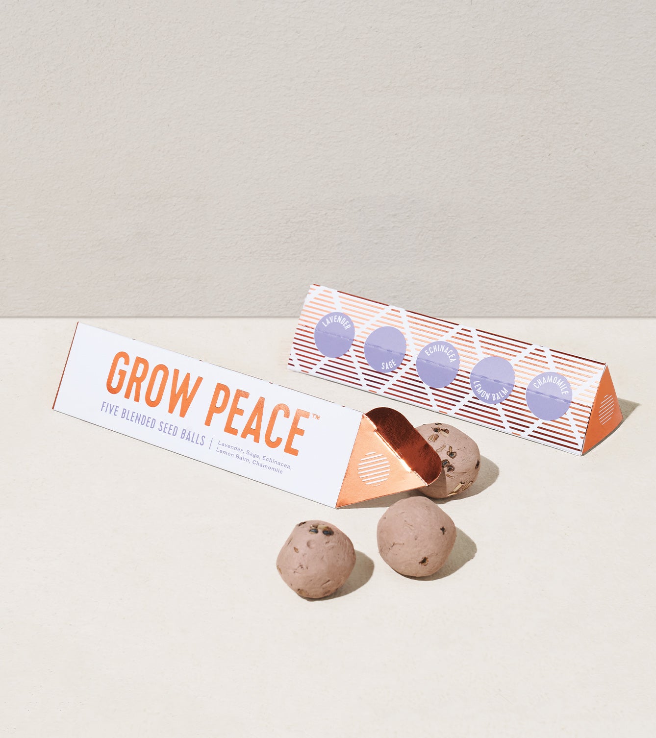 Bright Side Seed Balls packaging with three seed balls displayed, promoting easy planting for a vibrant garden.