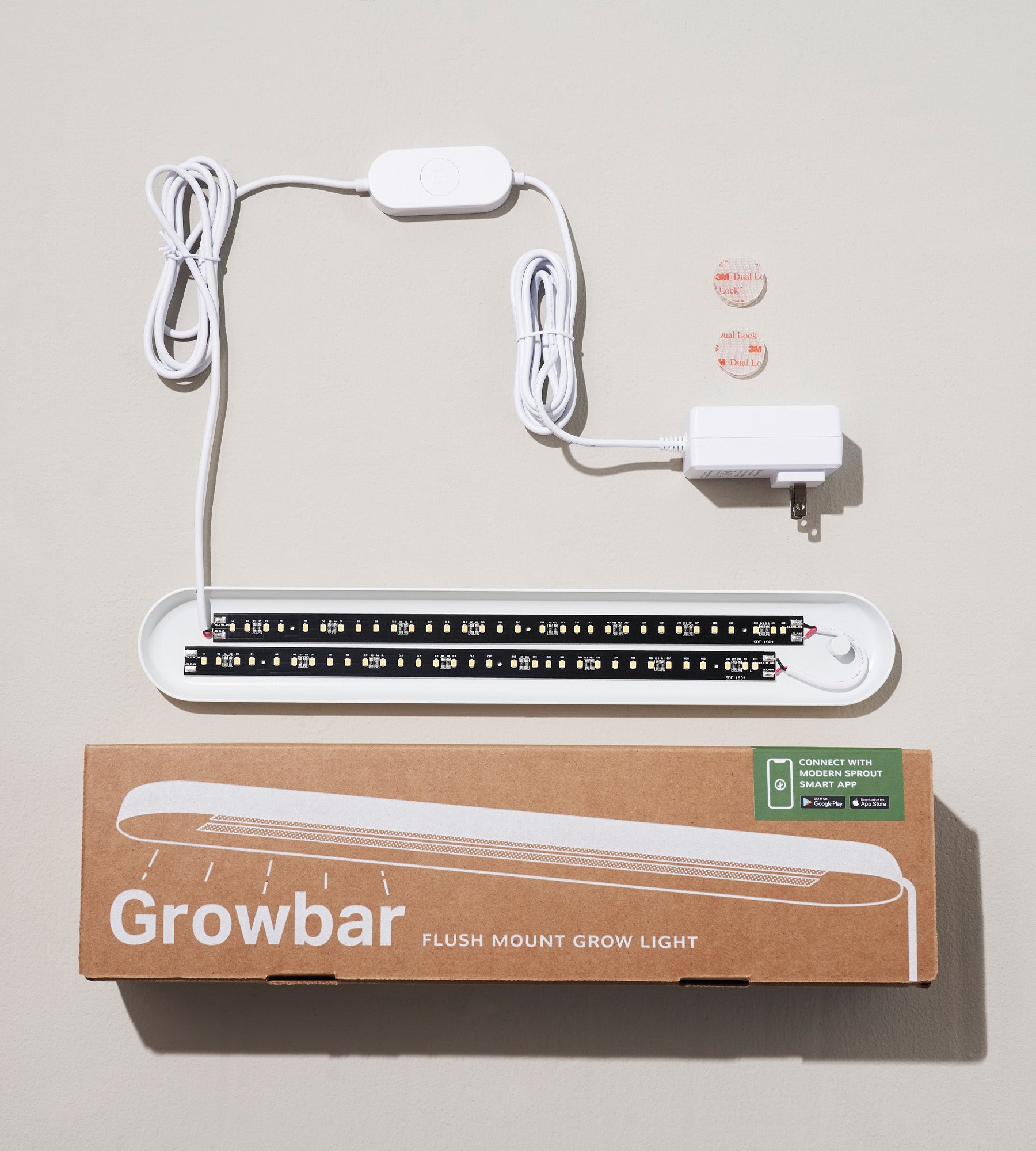Smart Growbar with a flush mount design, power cord, and adapter, displayed alongside its packaging on a neutral background.