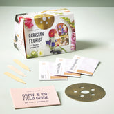 Seed collection kit featuring flower seeds, planting accessories, and a guide for growing cut flowers.